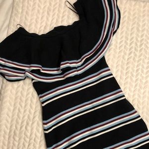 Gianni Binni off the should dress.